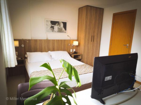Quarto Executivo para Sua Estadia de Trabalho